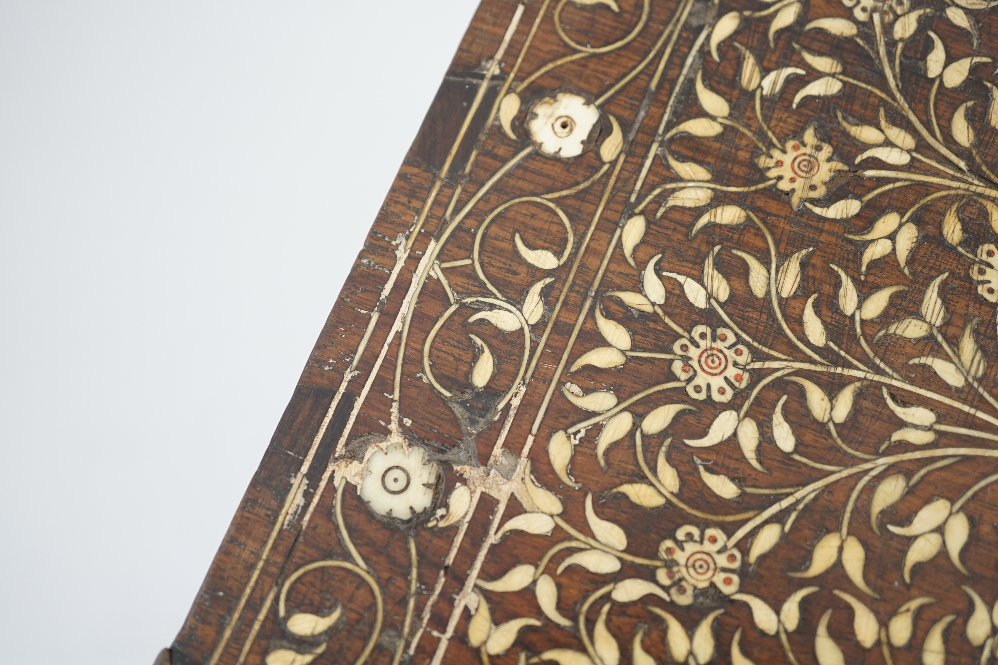 An early 17th century Indo-Portuguese ivory inset hardwood travelling chest